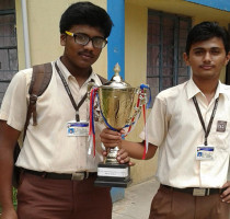 Sudev-Rajashree-Pradhan-and-Sanket-Dash-of-Std.-IX-bagging-the-Champion-School-Award-in-All-Odisha-Mining-Association-Competition.