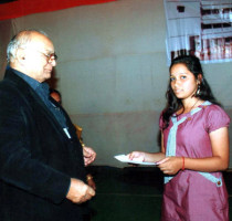 Ms.-Sharmistha-Prasad-receiving–a-Cash-award-for–being-the-2nd-topper-for-ICSE-Examination-2011.